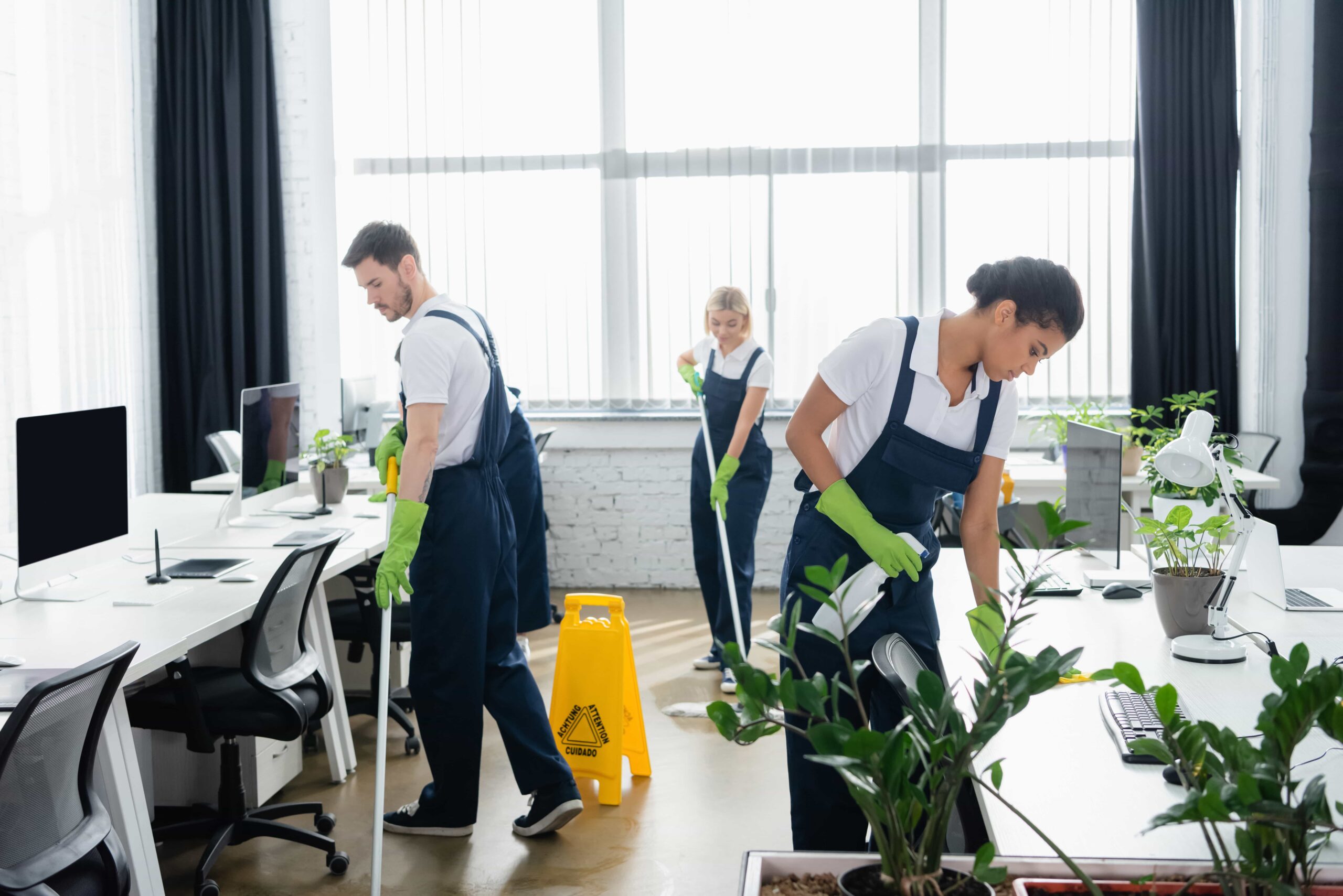 Commercial cleaning company team at work