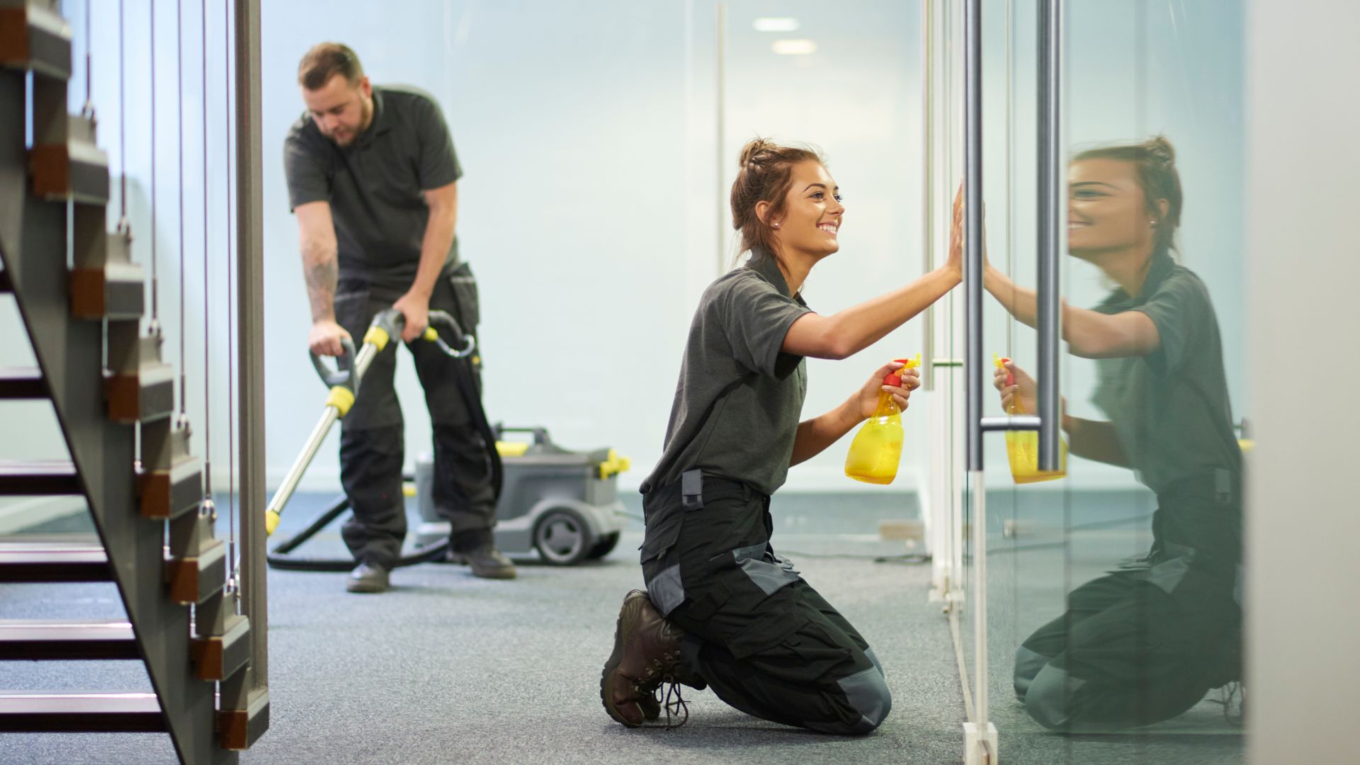 Professional commercial cleaning team working in a Charlotte office