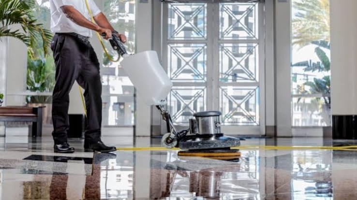 Commercial floor cleaning with floor buffer