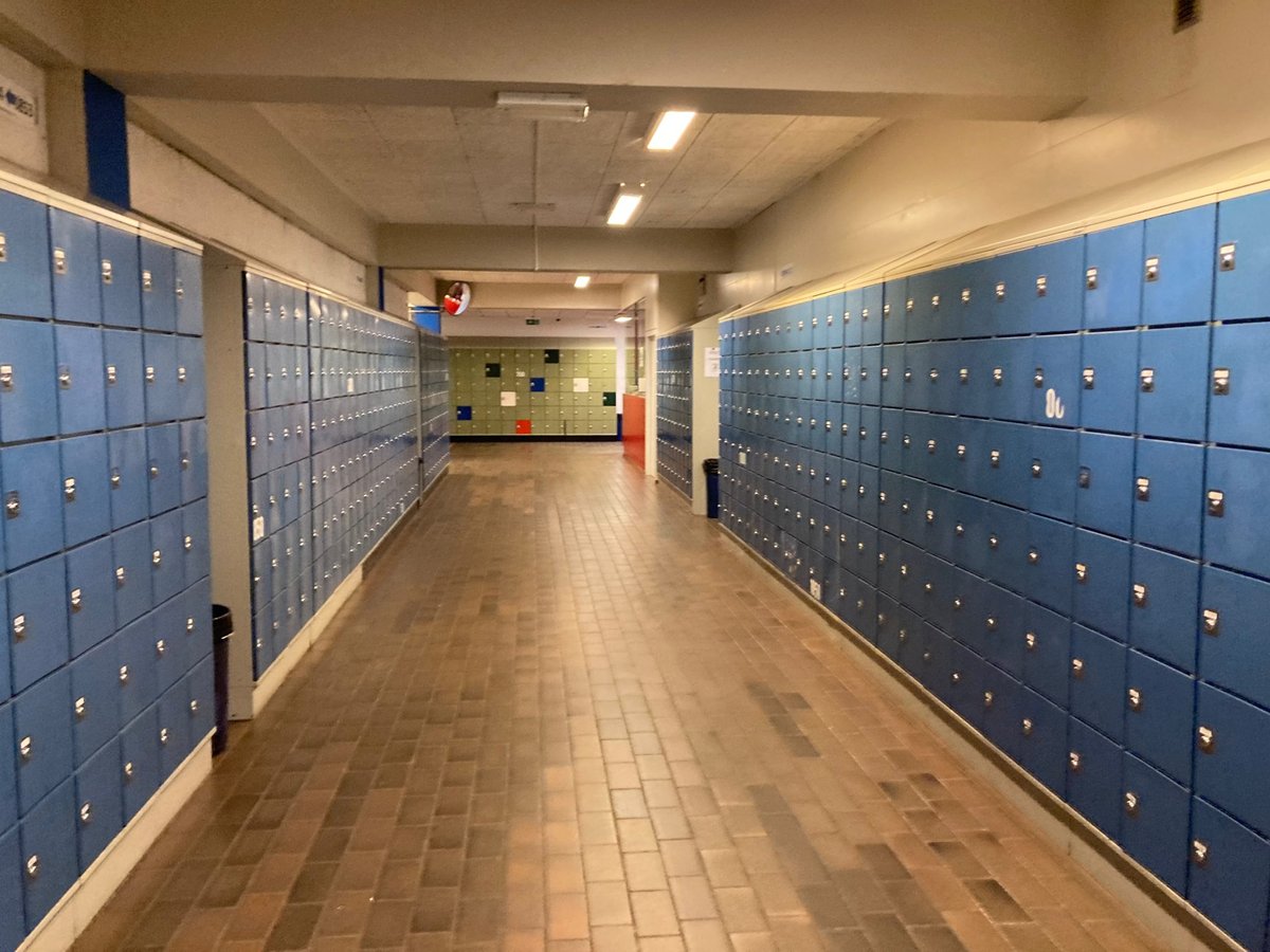 Commercial cleaning crew disinfecting a classroom in a Charlotte, NC school